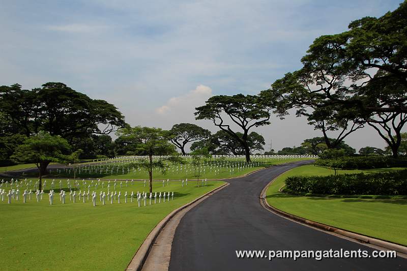 Driveway along the view of the circular pattern grave plots of Manila American Cemetery and Memorial in Global City Taguig.