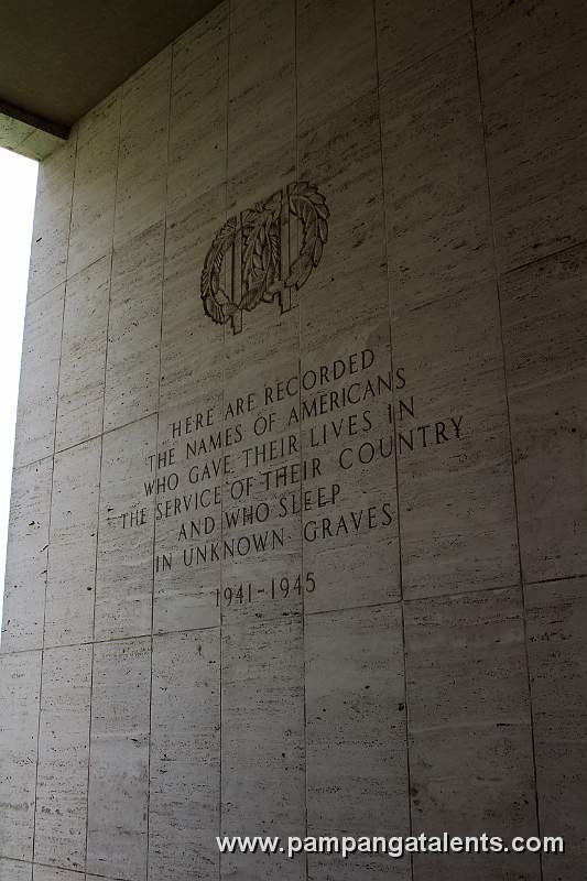 Inscription on the partition wall of the map room facing the list of the missing.