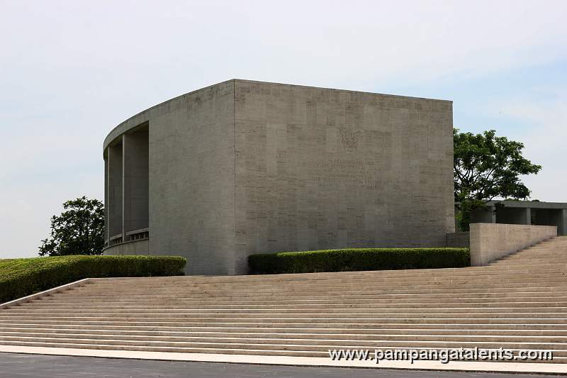 Dedicatory inscription of the end facade of  hemicycle in Manila American Cemetery and Memorial.