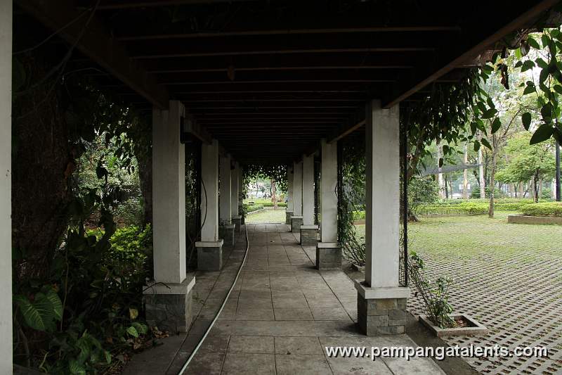 Walk-way Trellis along hardin ng mga Bulaklak in Overview of Landscape with Orchids Flower Accent in Quezon Memorial Circle in Quezon City.