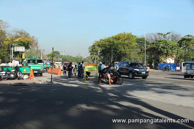 Waiting area for pedestrians crossing going to Quezon Memorial Circle.
