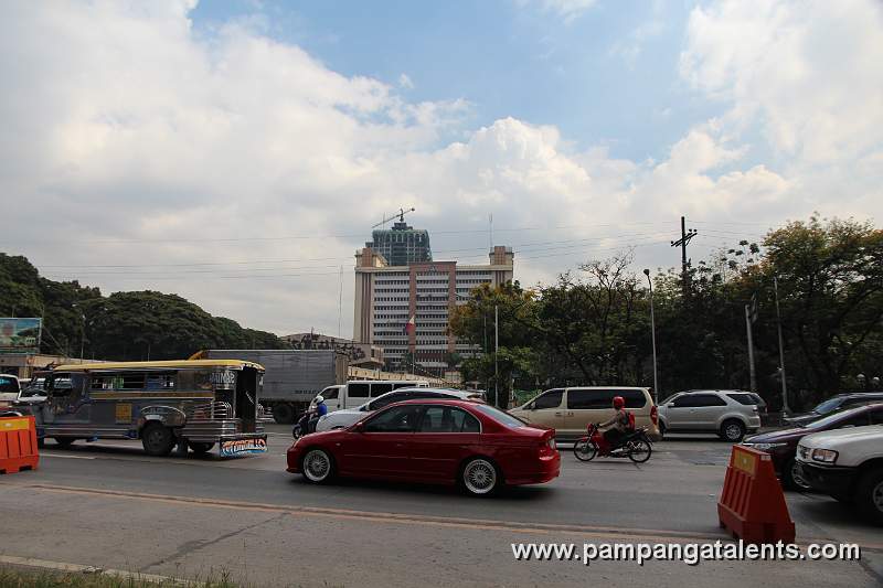 Traffic at Elliptical Road, Diliman with Quezon City Hall in Background.