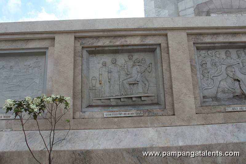 Sculpture of the Execution of the Three Martyrs or the GOMBURZA on Quezon Memorial Shrine Facade.