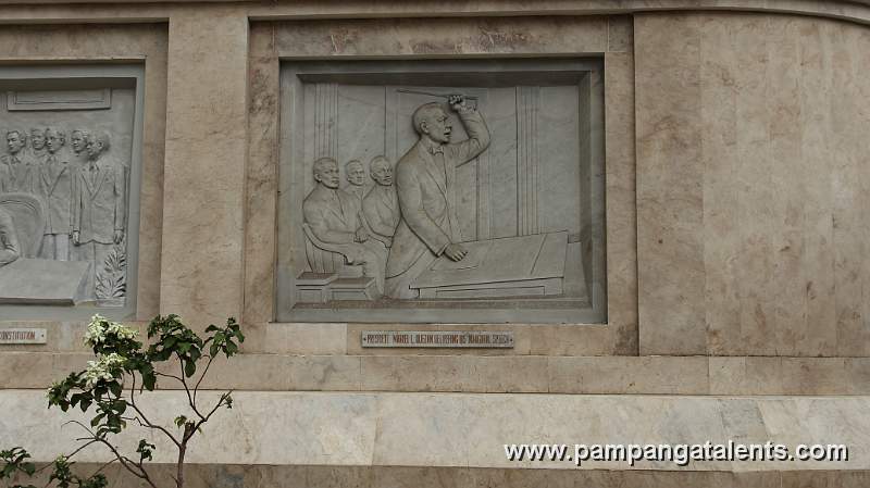Sculpture of President Manuel L. Quezon Delivering his Inaugural Speech on Quezon Memorial Shrine Facade.
