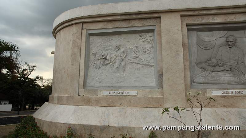 Sculture of President Quezon Planting of Rice on Quezon Memorial Shrine Facade.