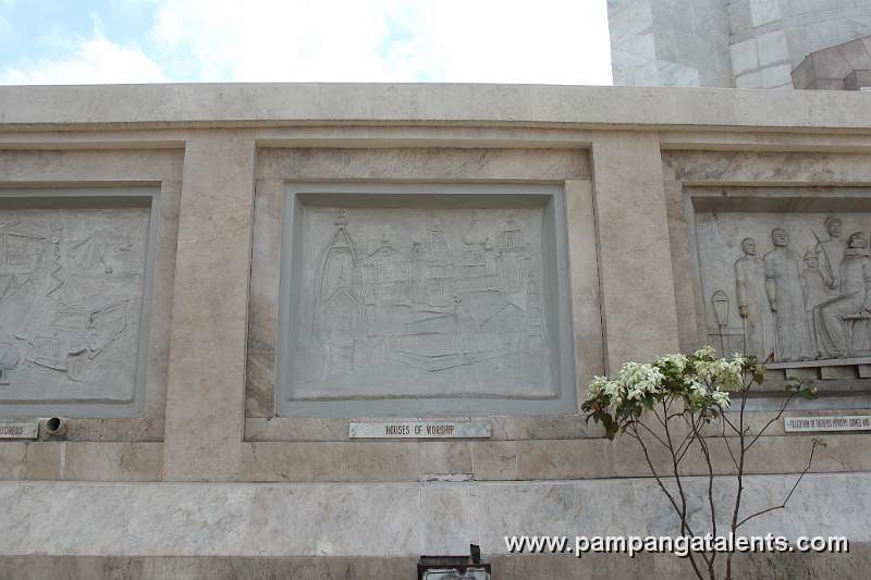 Sculpture of Different Houses of Worship on Quezon Memorial Shrine Facade.
