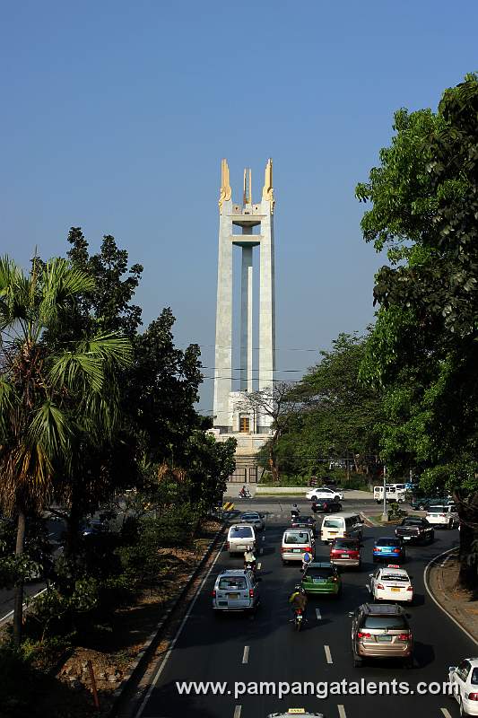 Quezon Avenue with Quezon Memorial Monument in the background.