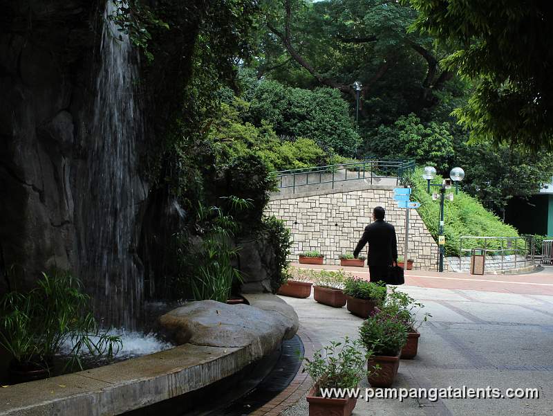 Businessman on water falls